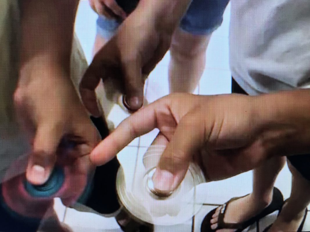 Hawaii kids playing with Fidget Spinners at windward mall.